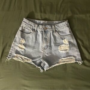 High waisted shorts with rips